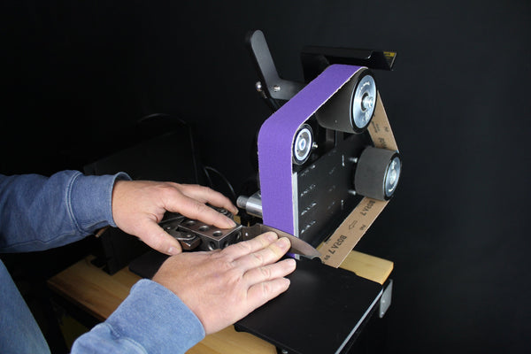 84 Engineering Shop Mate 2x48" bevel combo kit includes an angle adjustable rest, a 6mm plunge platen and an assortment of ceramic, zirconia and aluminium oxide belts - everything you need to create a knife