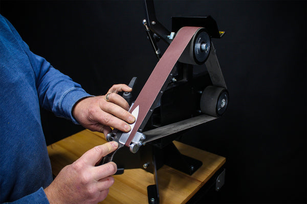 84 Engineering Shop Mate 2x48" bevel combo kit includes an angle adjustable rest, a 6mm plunge platen and an assortment of ceramic, zirconia and aluminium oxide belts - everything you need to create a knife