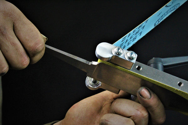 84 Engineering Shop Master 2x72" bevel combo kit includes an angle adjustable rest, a 6mm plunge platen and an assortment of ceramic, zirconia and aluminium oxide belts - everything you need to create a knife  Edit alt text