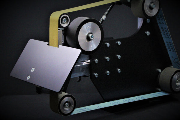 84 Engineering Shop Master 2x72" bevel combo kit includes an angle adjustable rest, a 6mm plunge platen and an assortment of ceramic, zirconia and aluminium oxide belts - everything you need to create a knife  Edit alt text