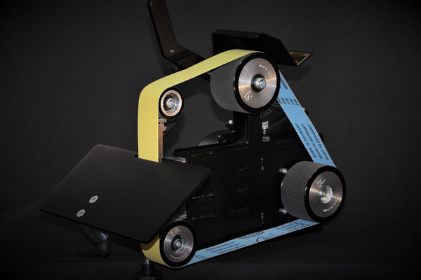 84 Engineering Shop Mate 2x48" bevel combo kit includes an angle adjustable rest, a 6mm plunge platen and an assortment of ceramic, zirconia and aluminium oxide belts - everything you need to create a knife